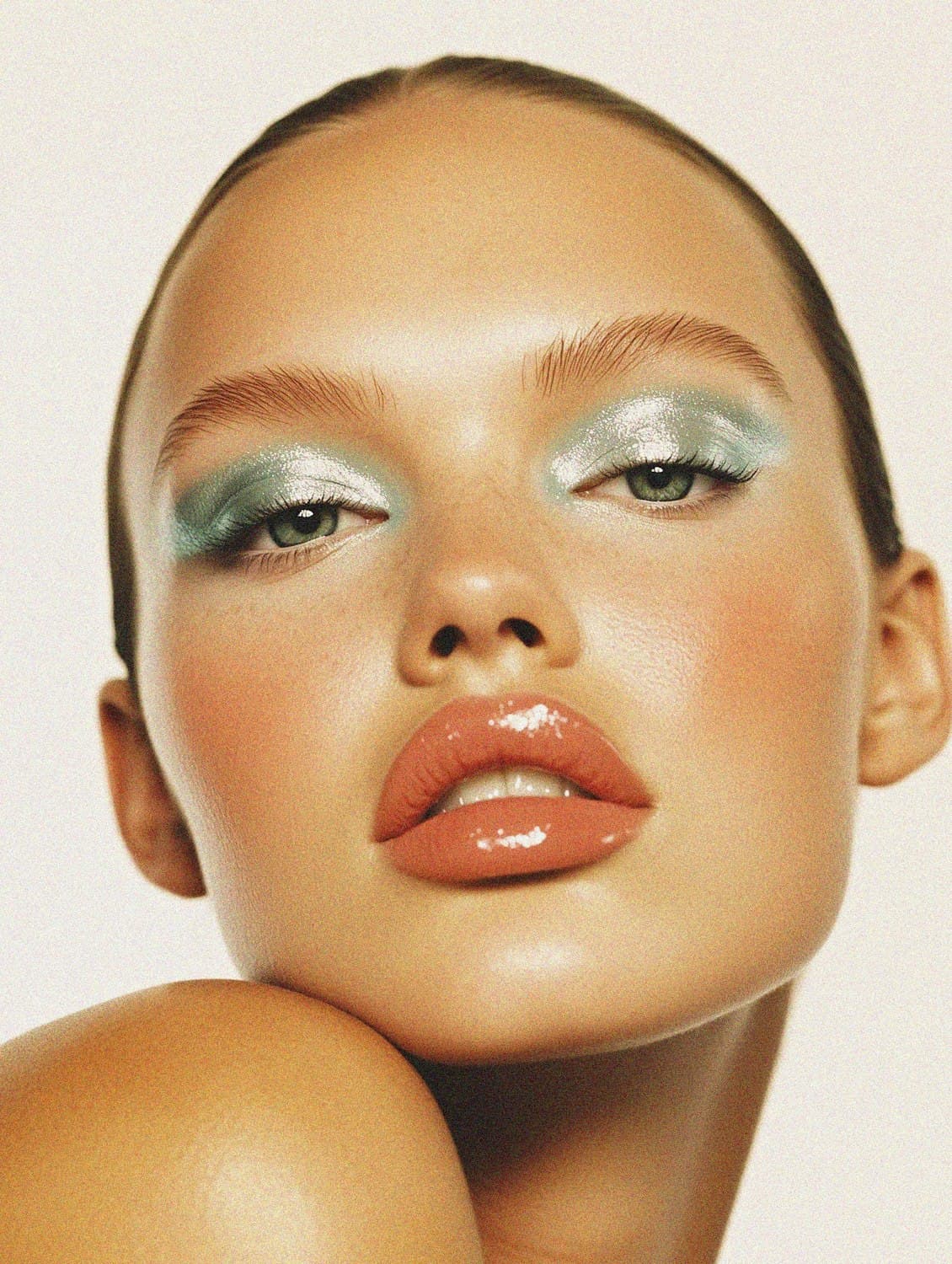 Glamorous party makeover with shimmering eyeshadow and glossy lips